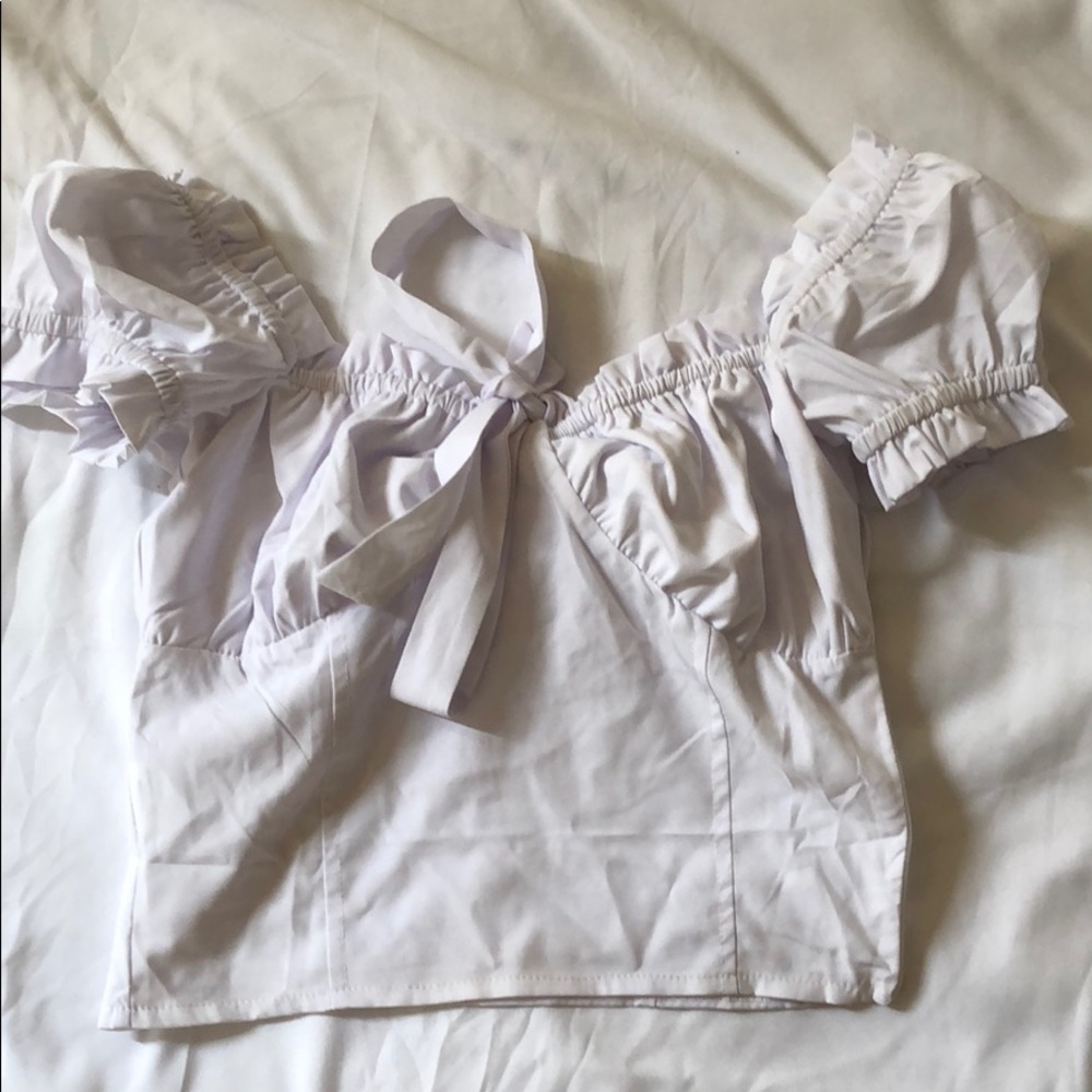 White ruffle off the shoulder shirt